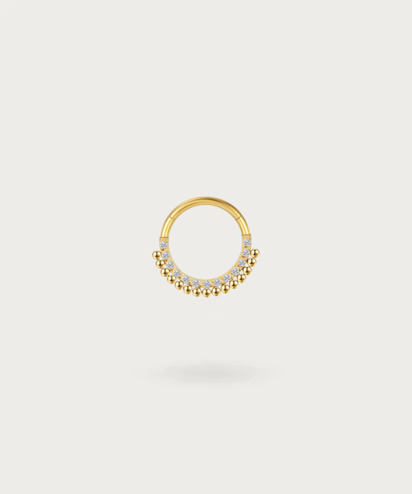 Gold Snug Ringpiercing mit Blumenmuster