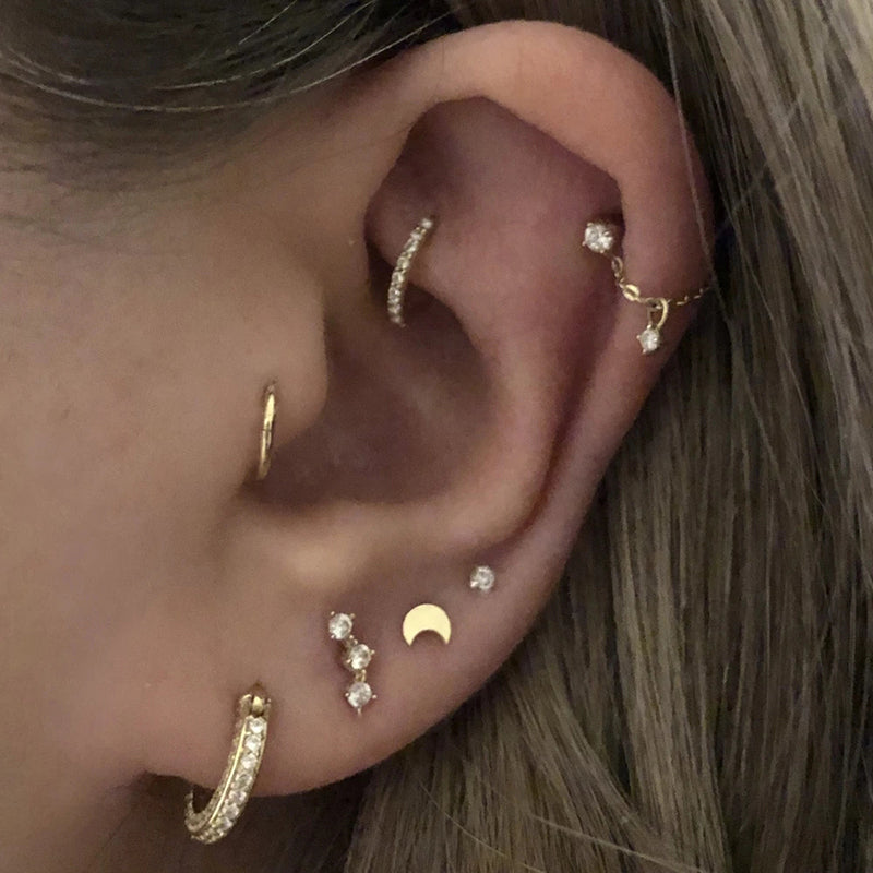 Diamant tragus piercing Frau